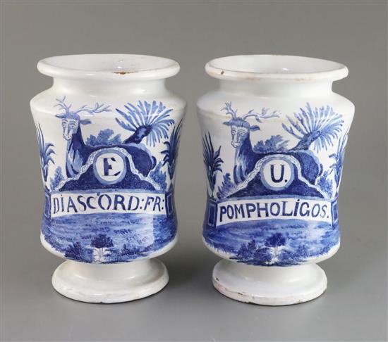 A pair of Dutch delft blue and white drug jars, c.1800, H. 21.7cm